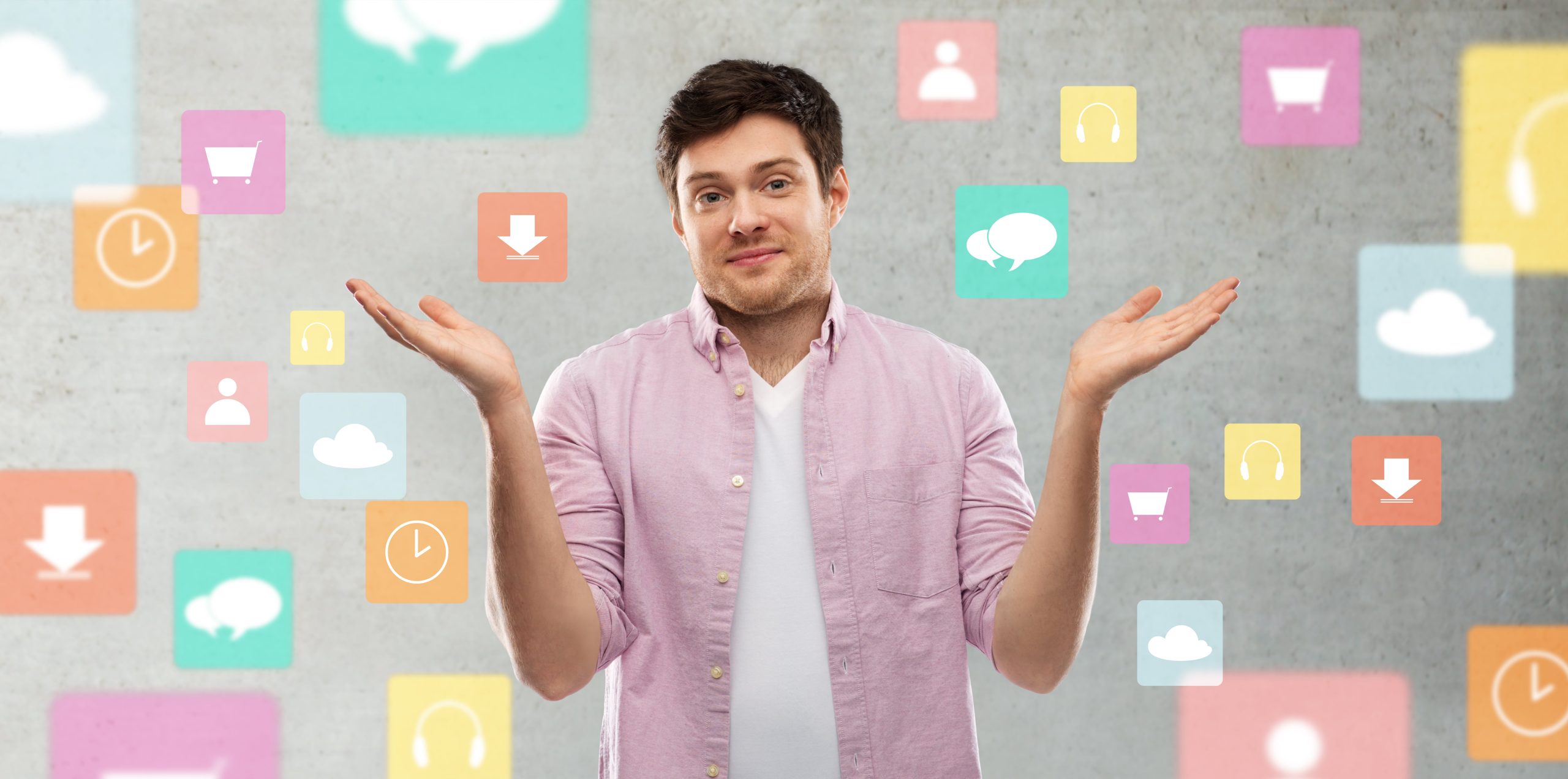 Young man shrugging while surrounded by floating social media icons, representing the complexity of social media trends in 2026.